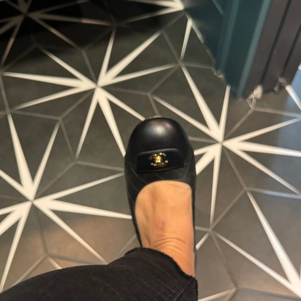 Chanel Black Quilted Flats with Gold Logo - Picture 6 of 7